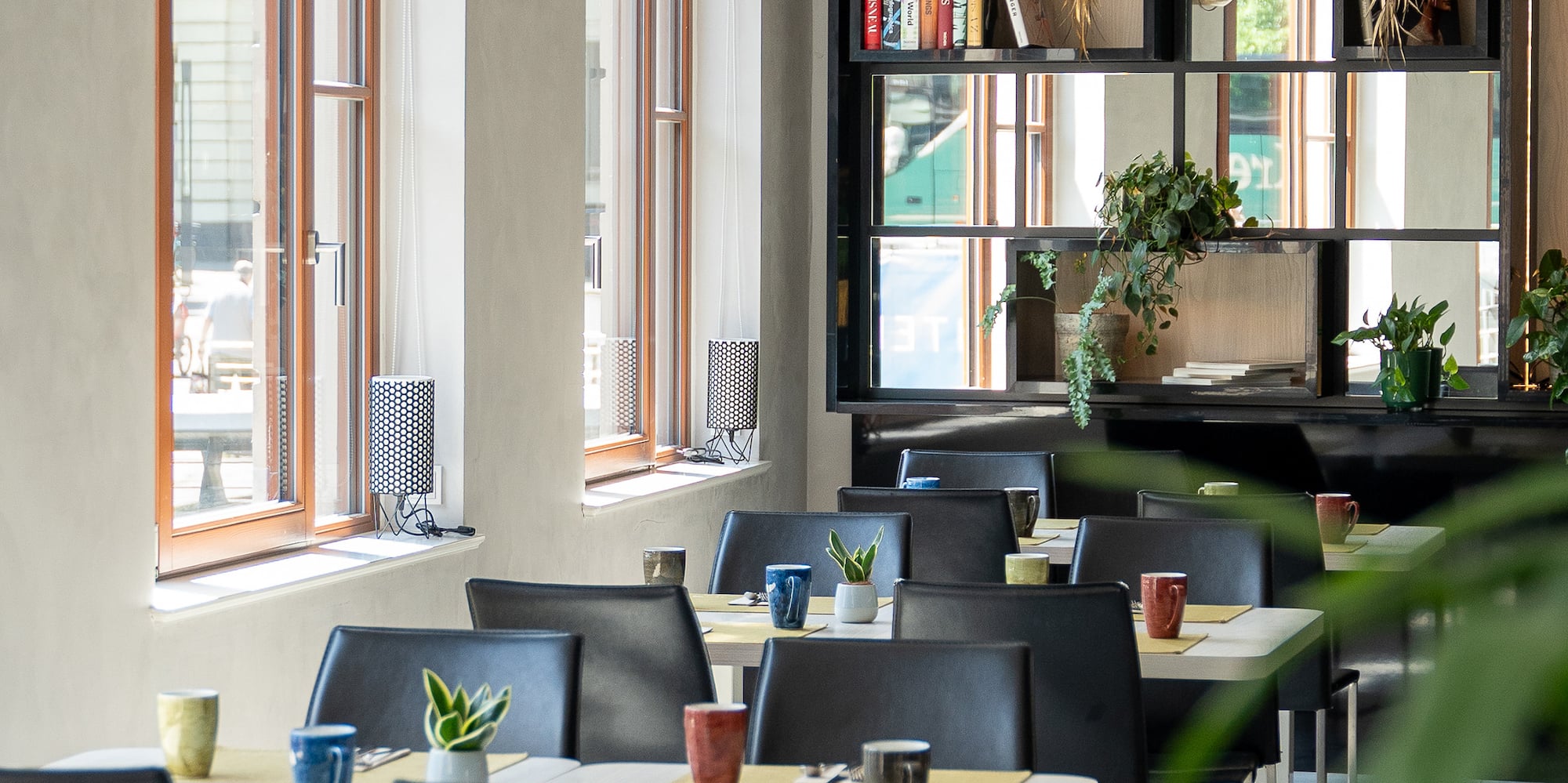 a room with tables and chairs