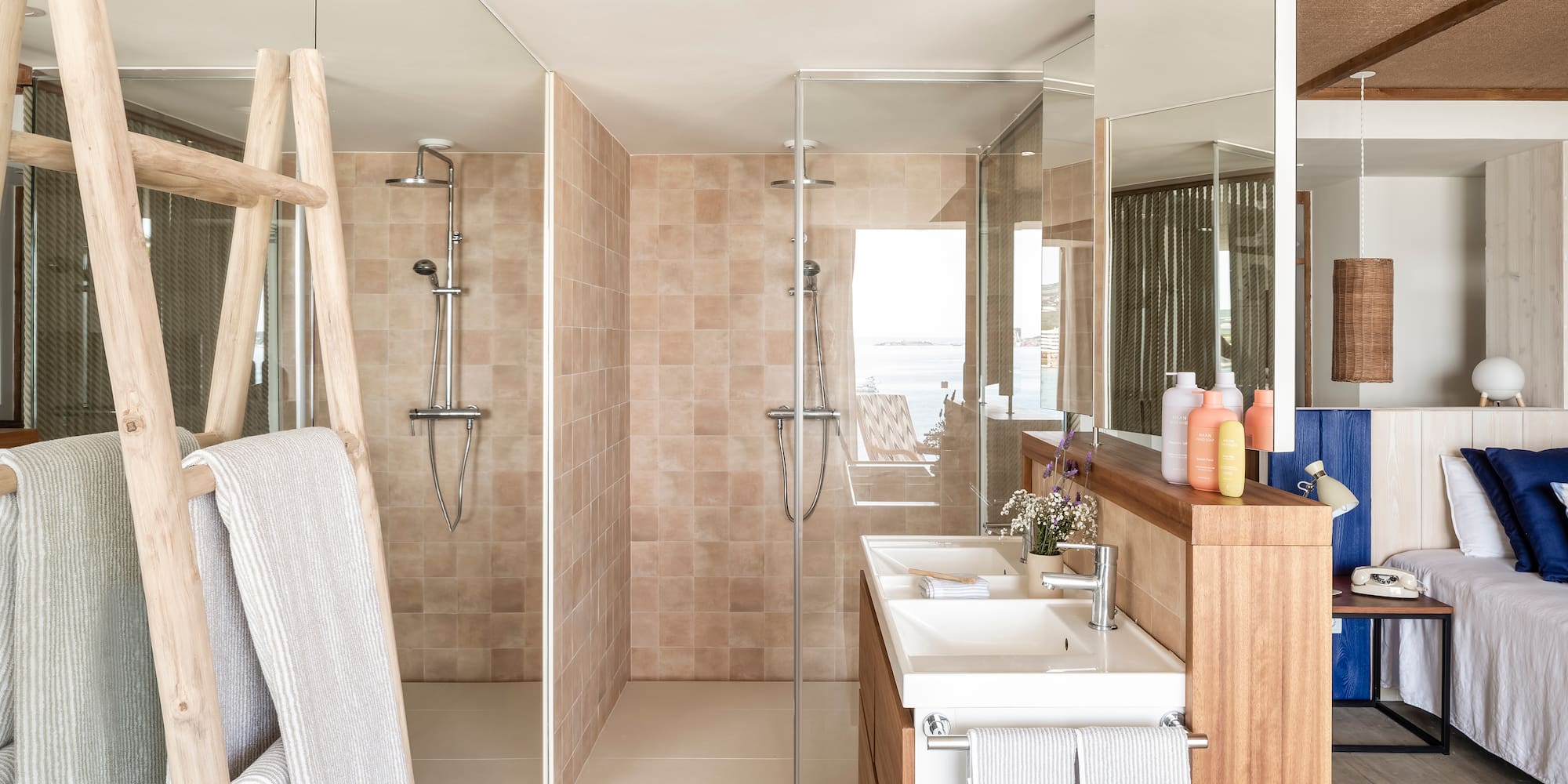 a bathroom with a shower and sink