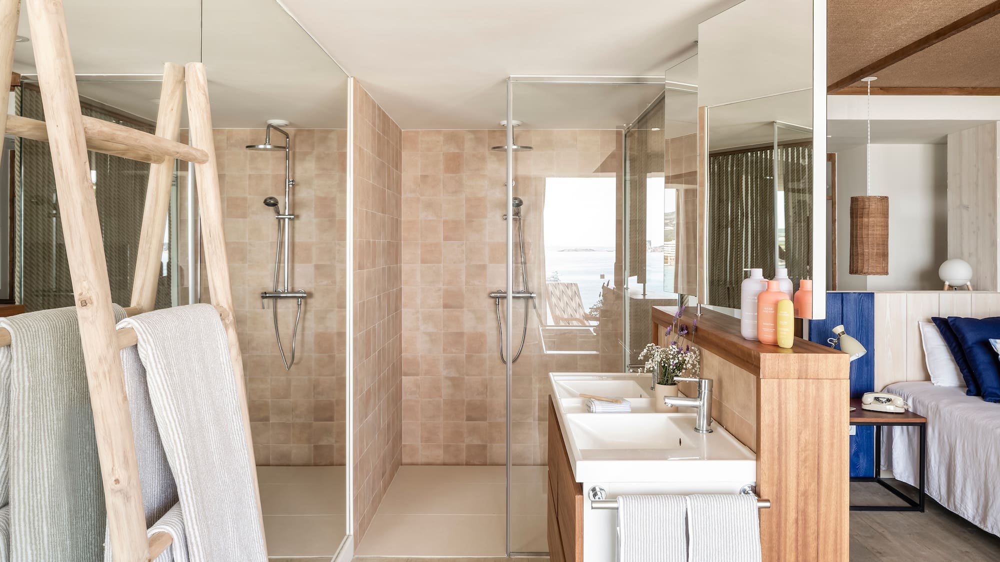 a bathroom with a shower and sink