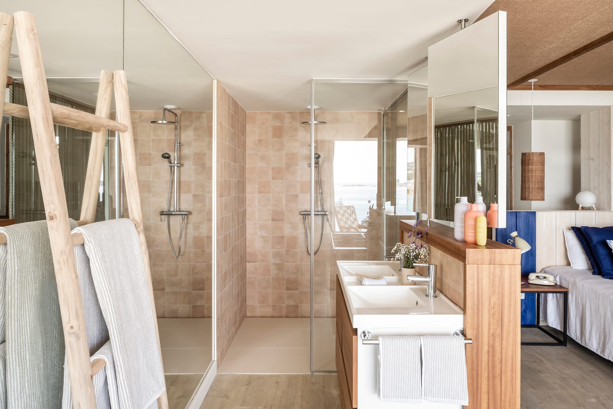 a bathroom with a shower and sink