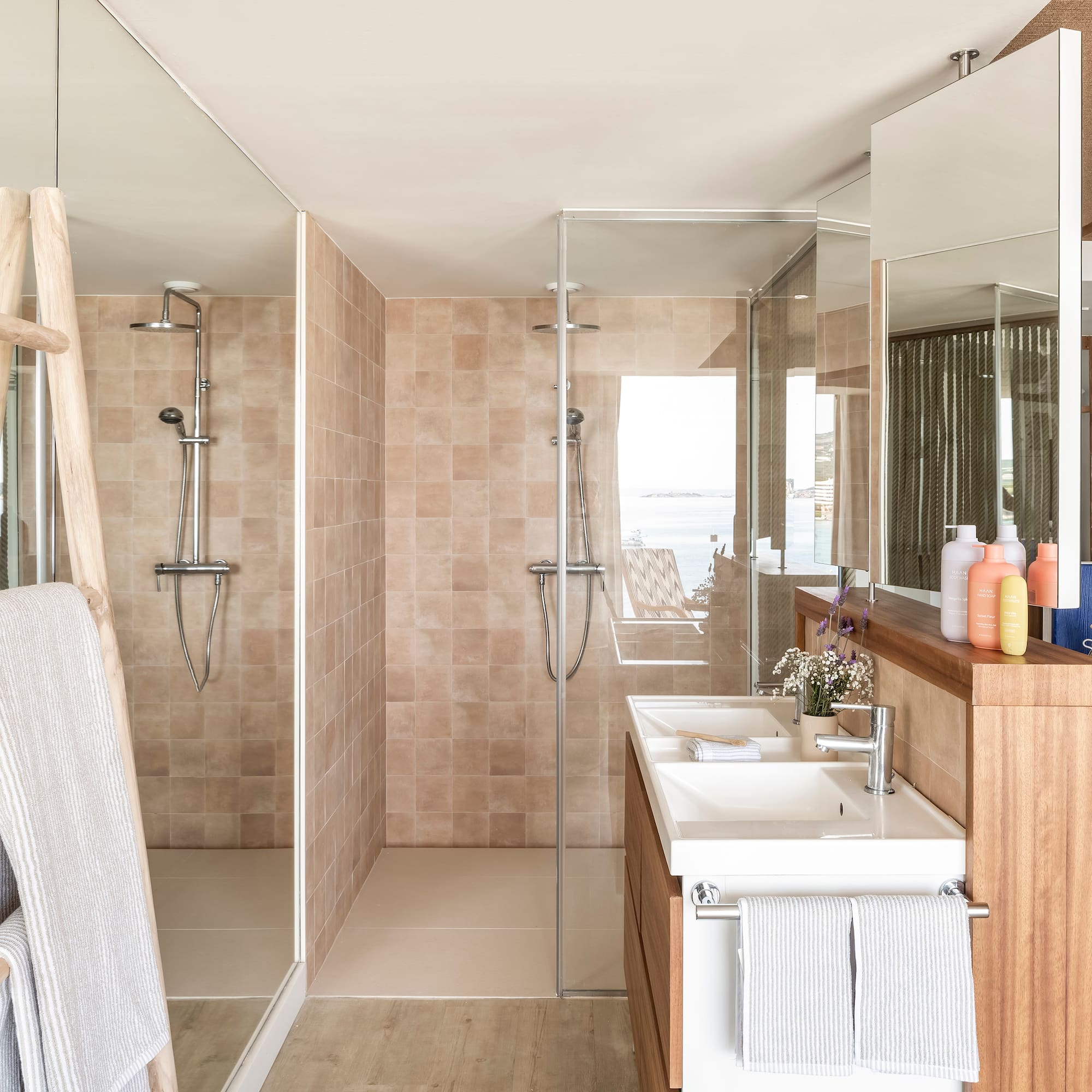 a bathroom with a shower and sink