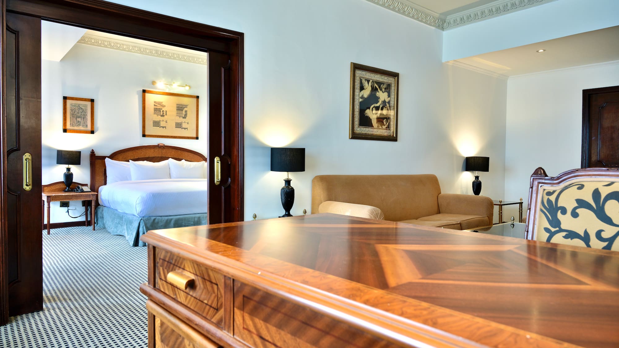 a room with a bed and a desk