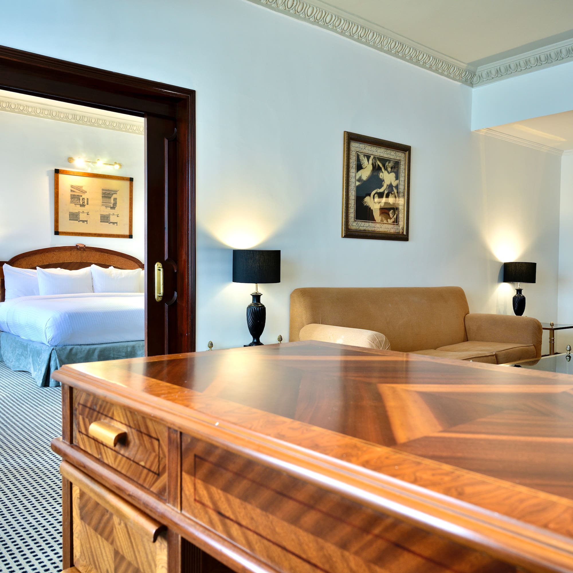 a room with a bed and a desk