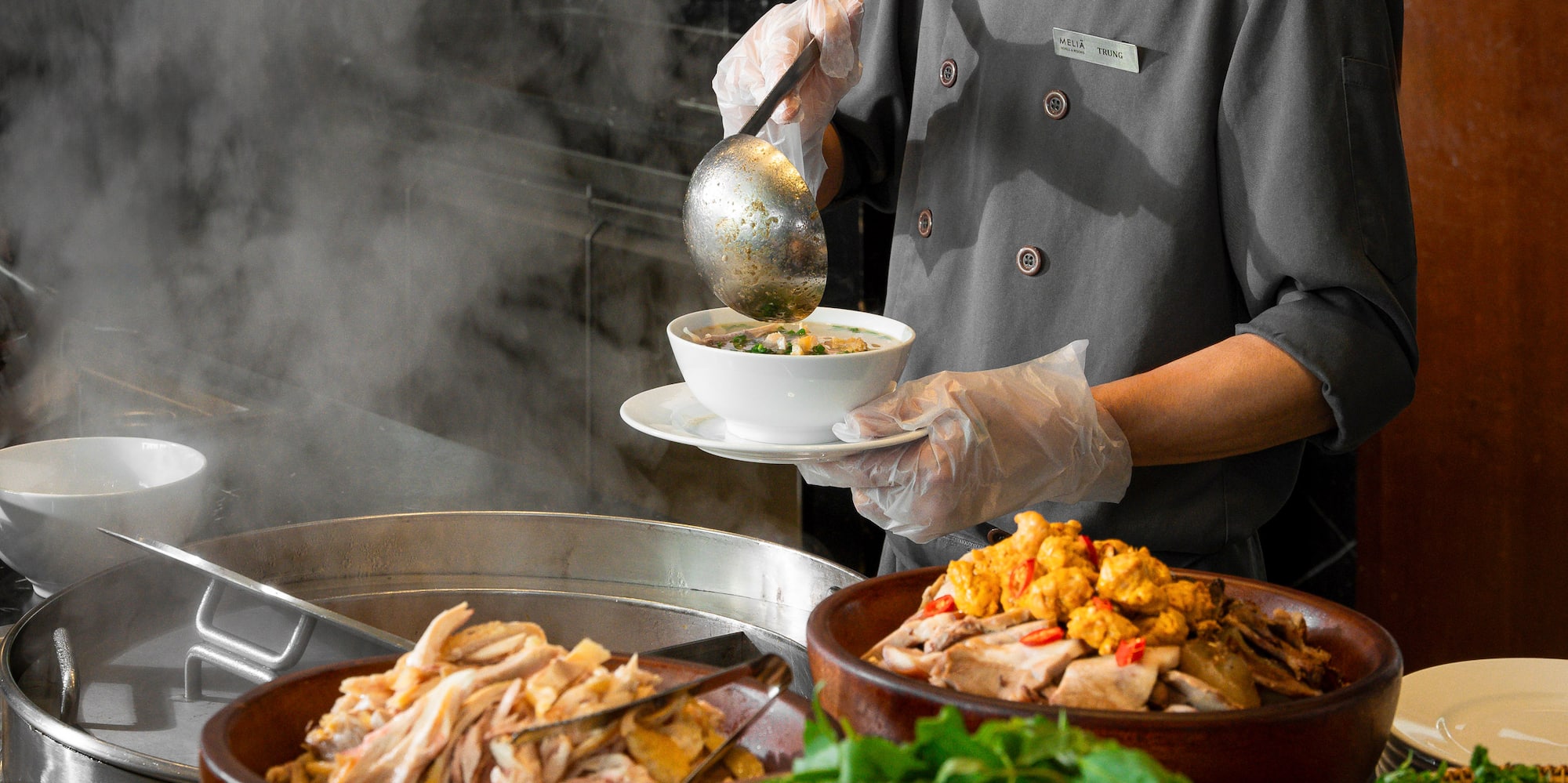 a chef preparing food in a kitchen
