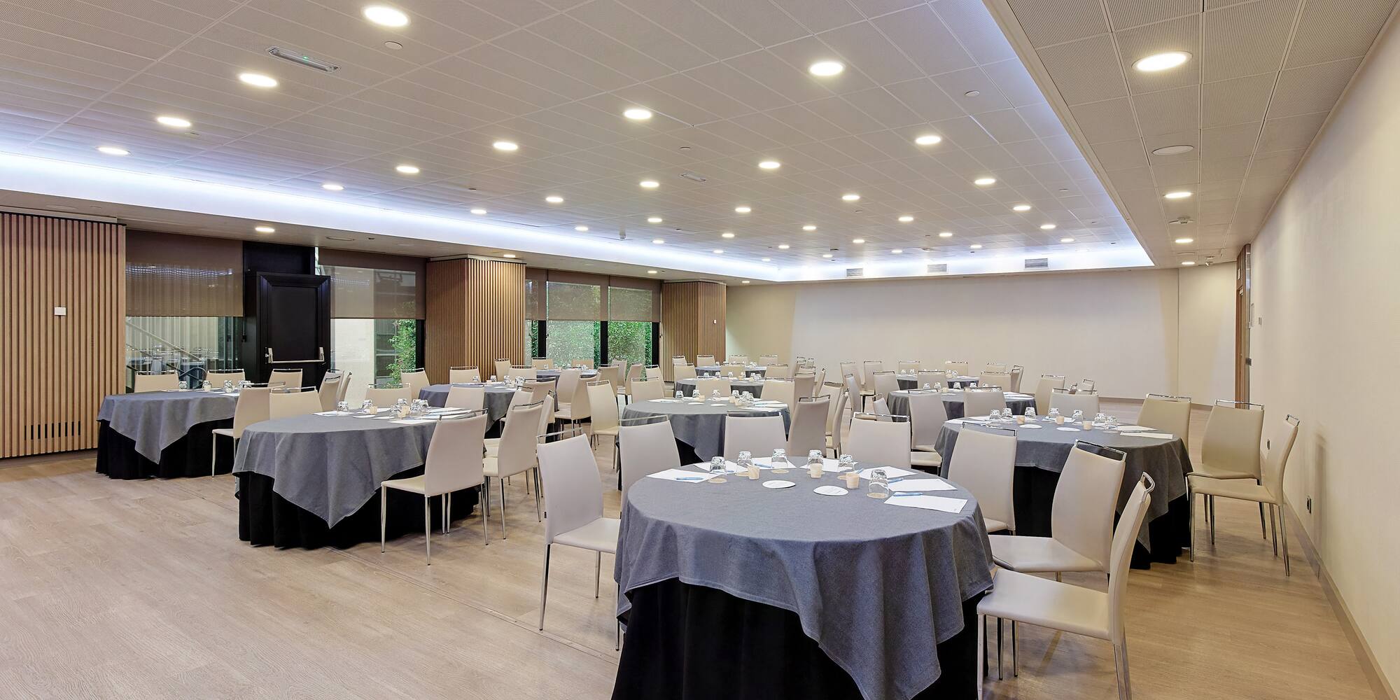 a room with tables and chairs