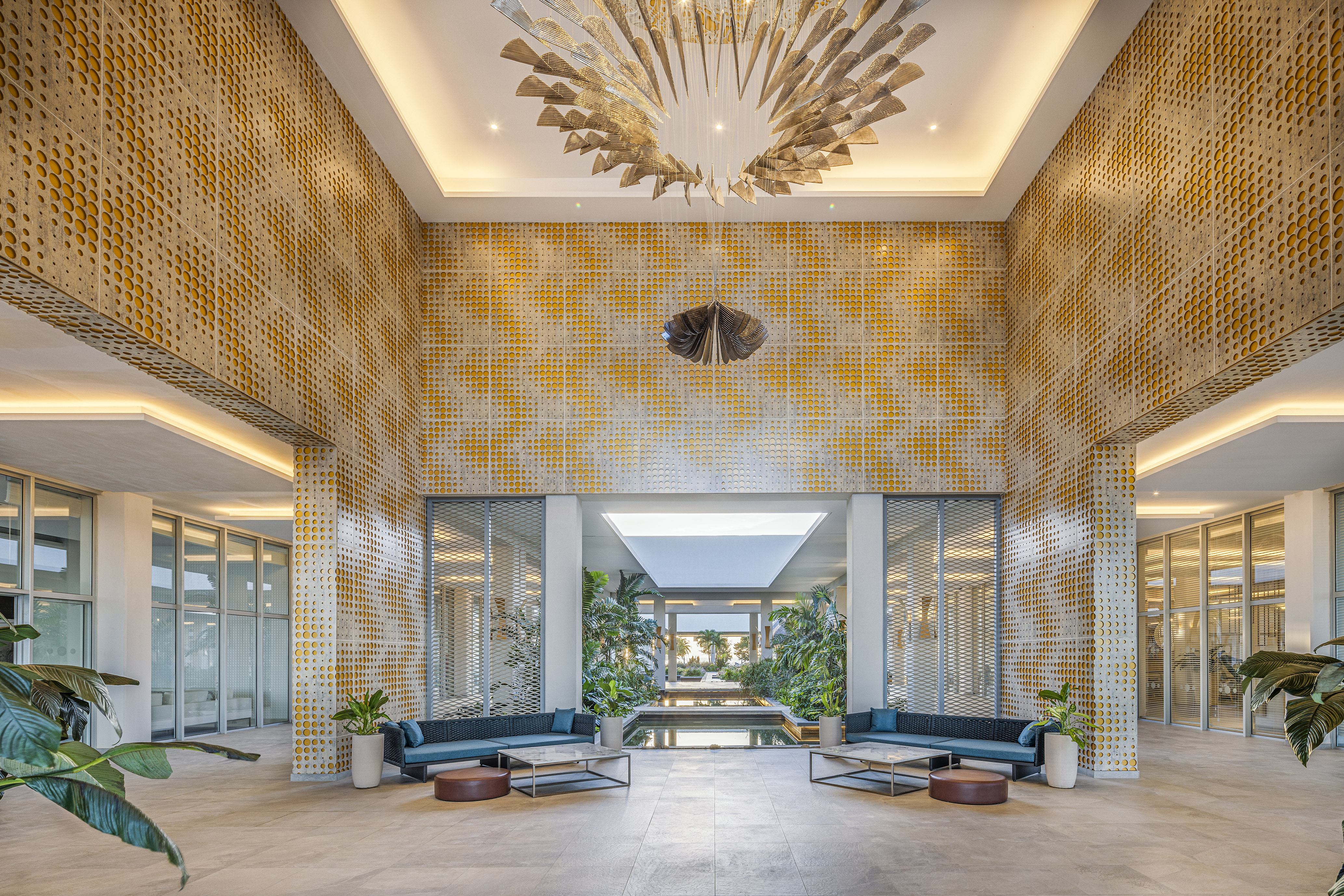 a large room with a large chandelier and a large ceiling