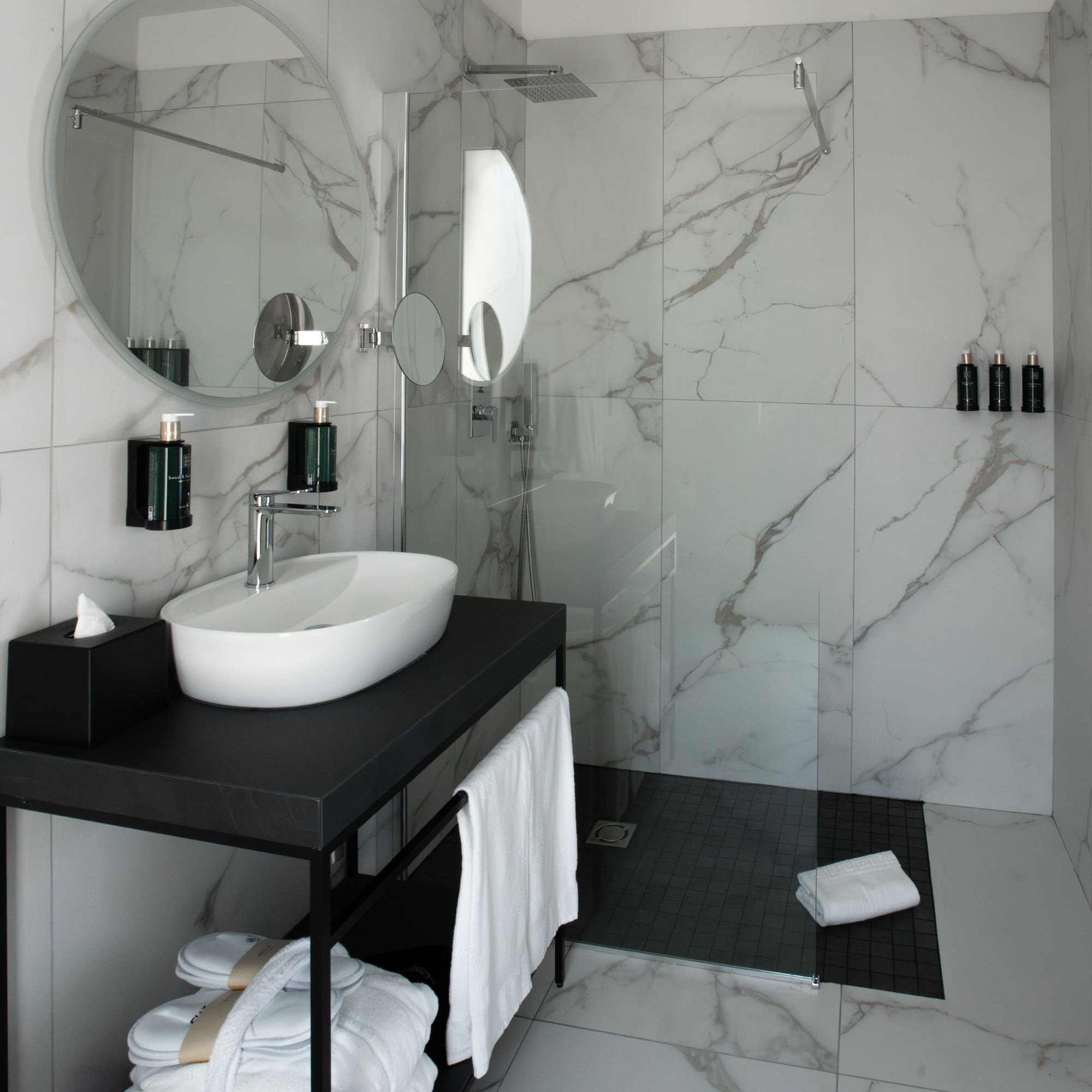 a bathroom with a sink and shower