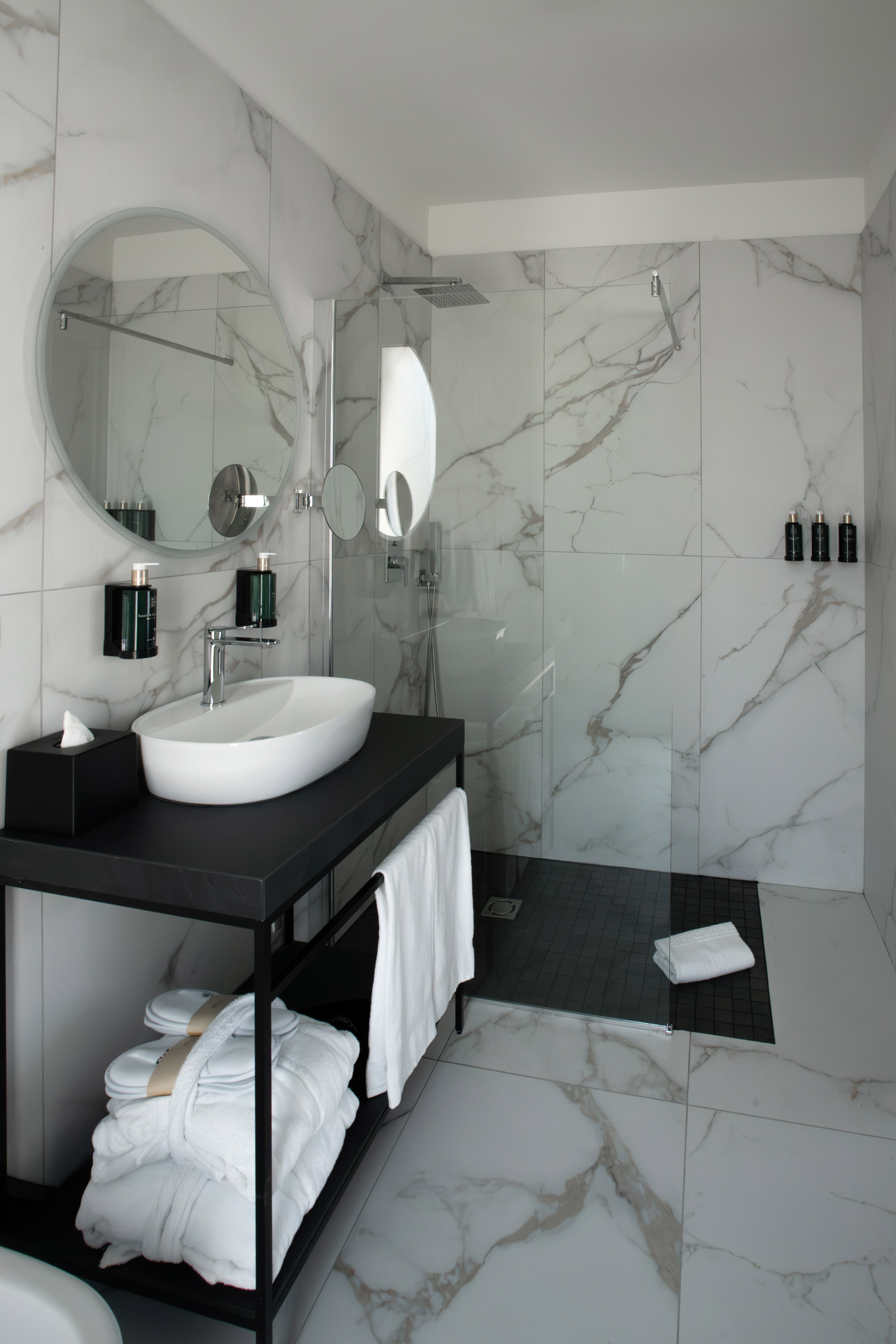 a bathroom with a sink and shower