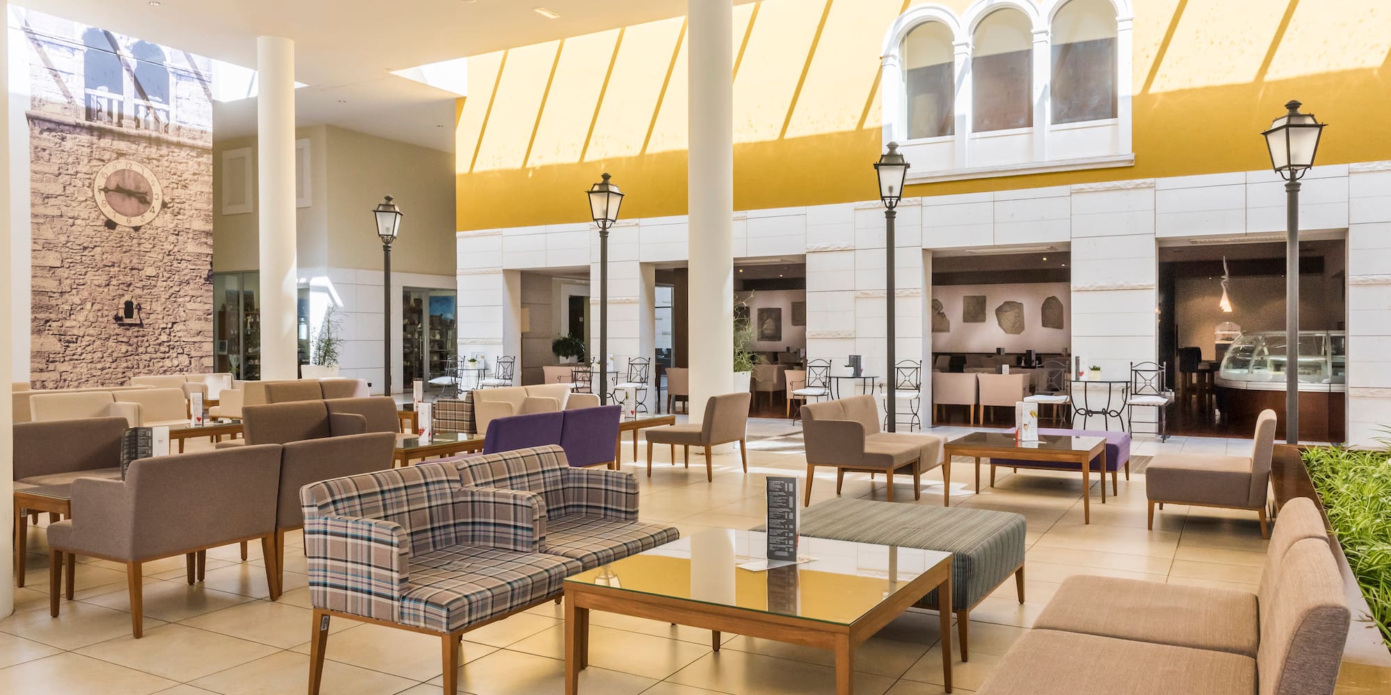 a room with couches and tables