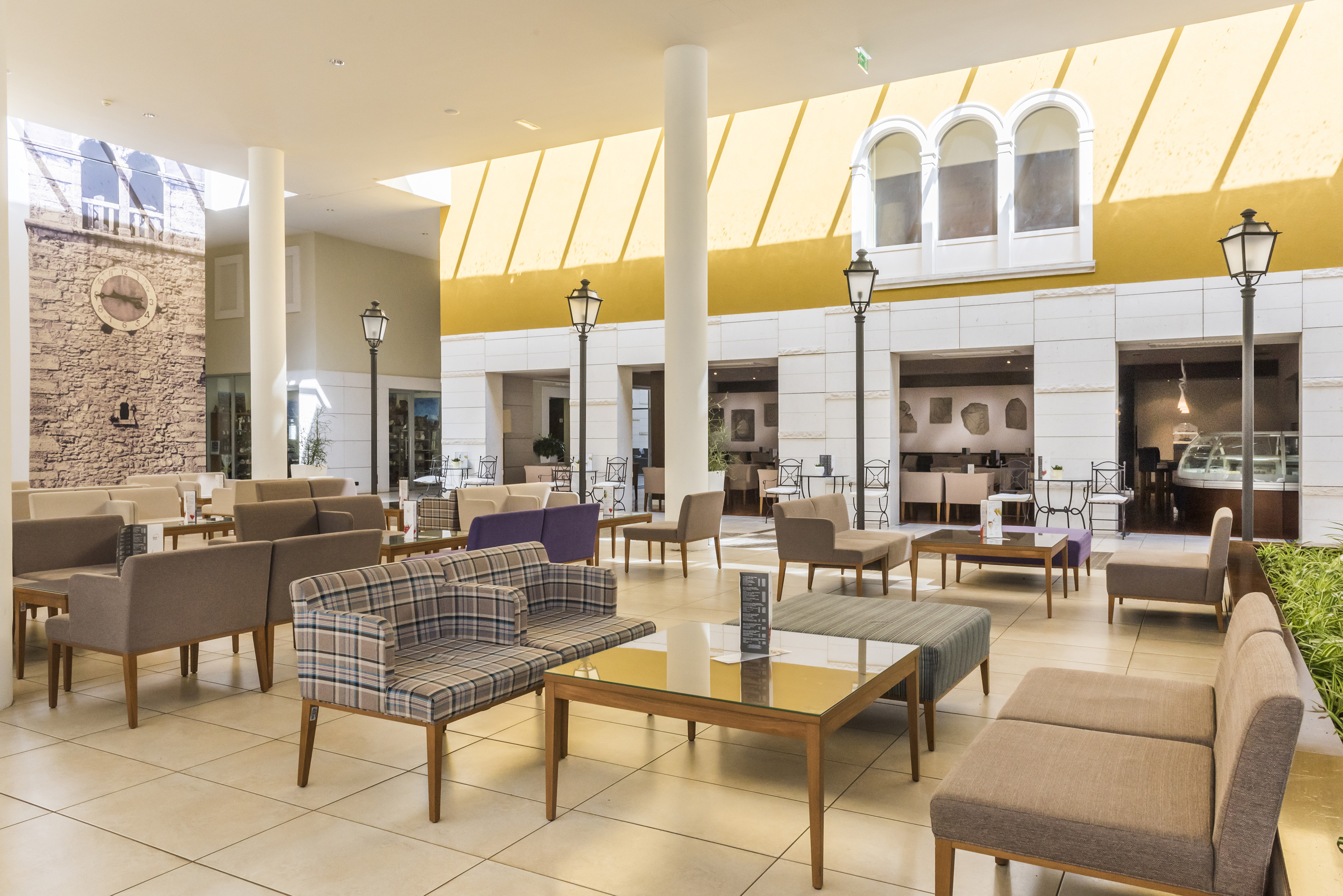 a room with couches and tables