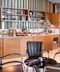 a room with a table and chairs