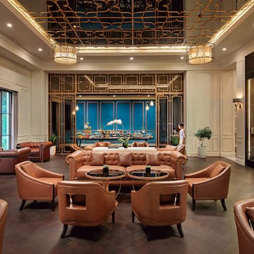 a room with a large table and chairs