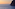 a body of water with a boat in the distance