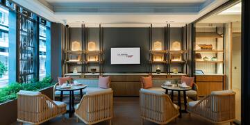 a room with a television and tables