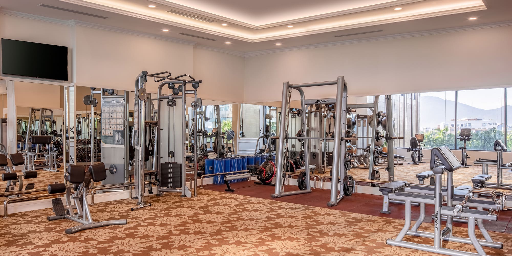 a large room with gym equipment
