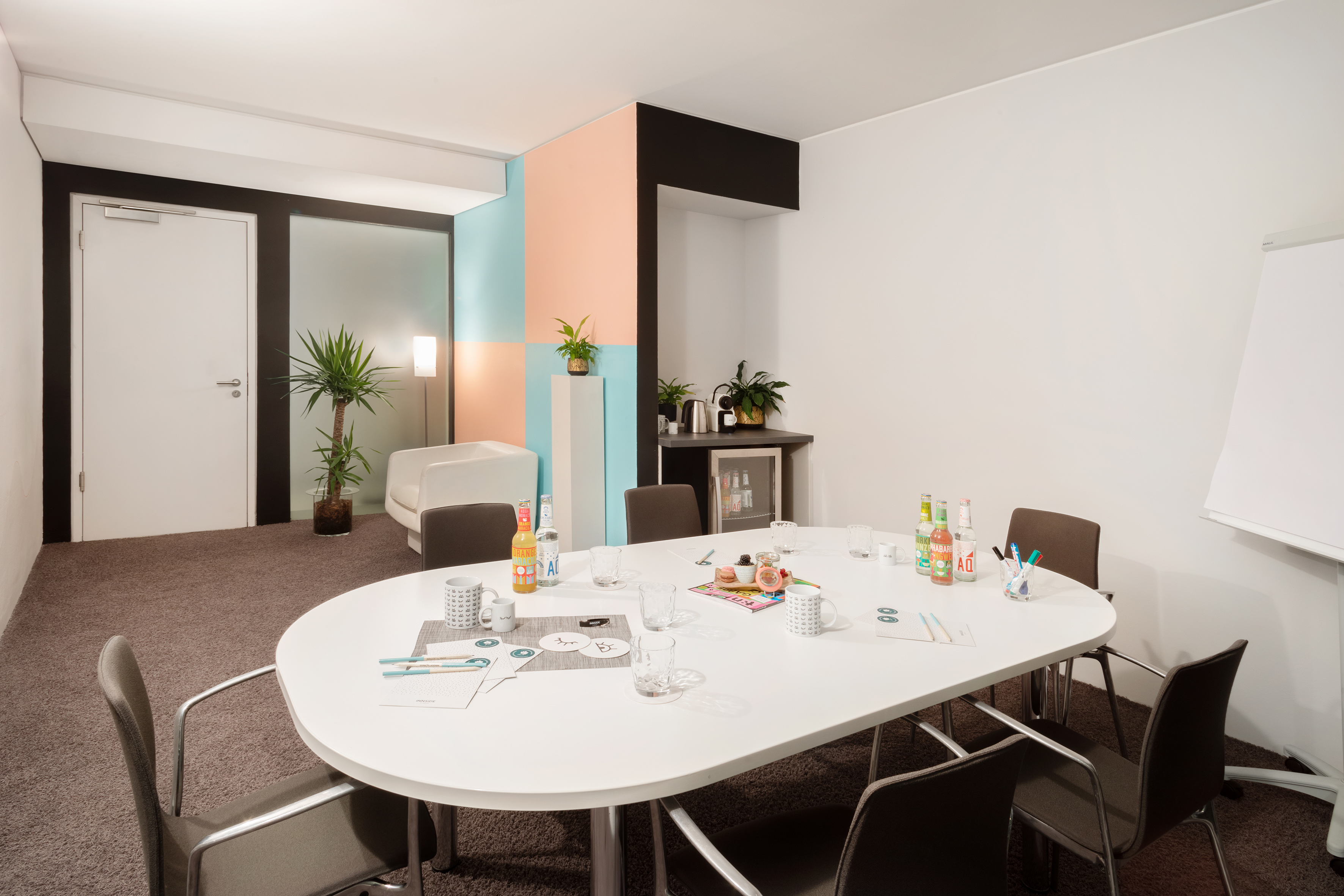 a room with a table and chairs