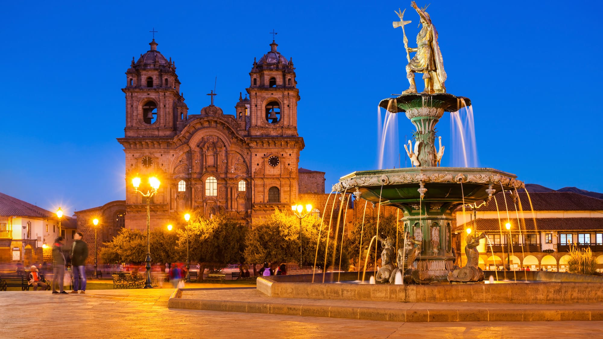 a fountain in front of a building