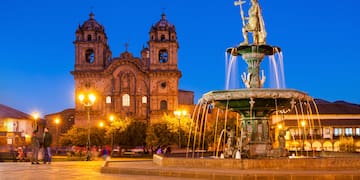 a fountain in front of a building