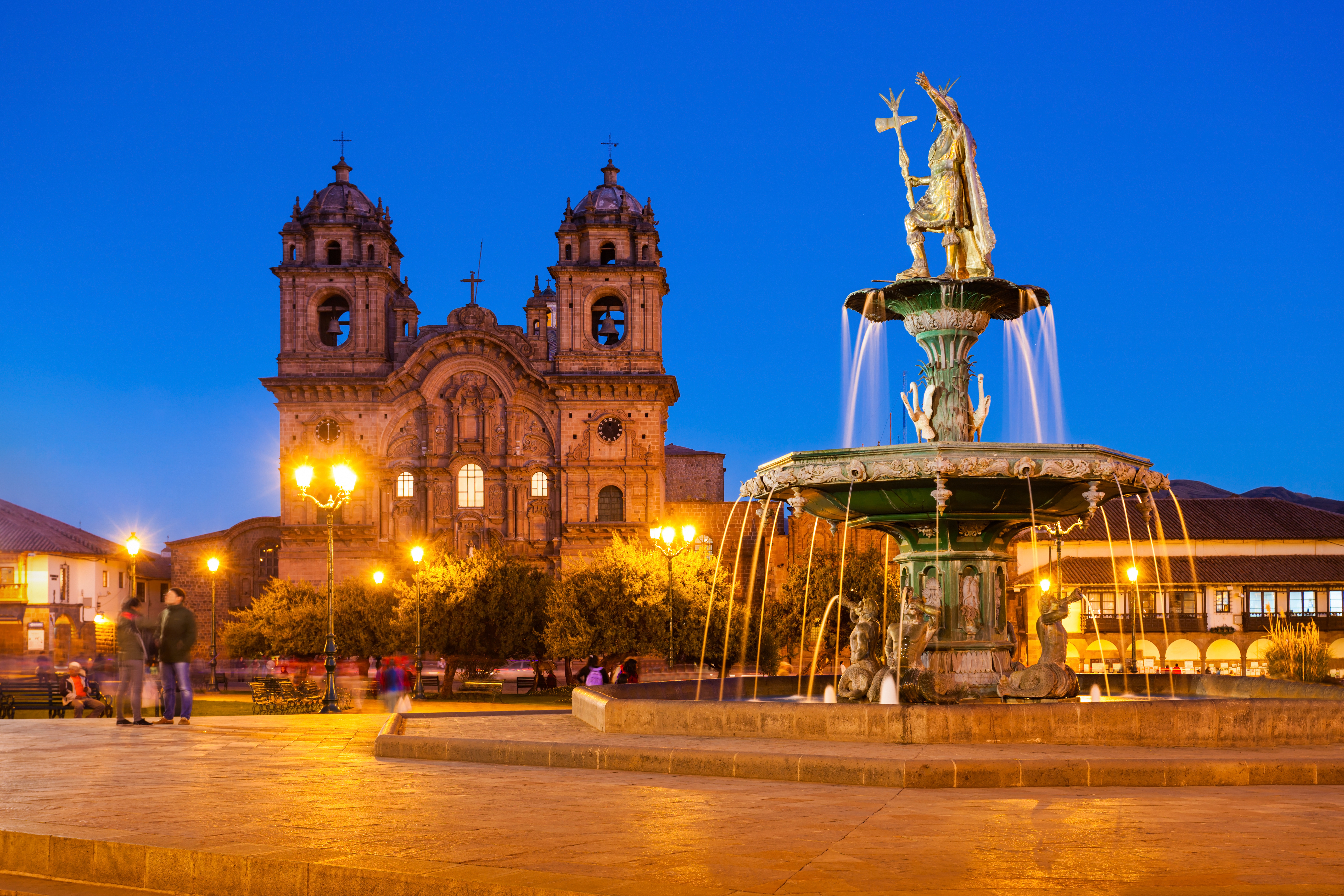 a fountain in front of a building