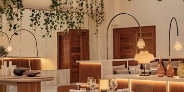 a restaurant with tables and chairs