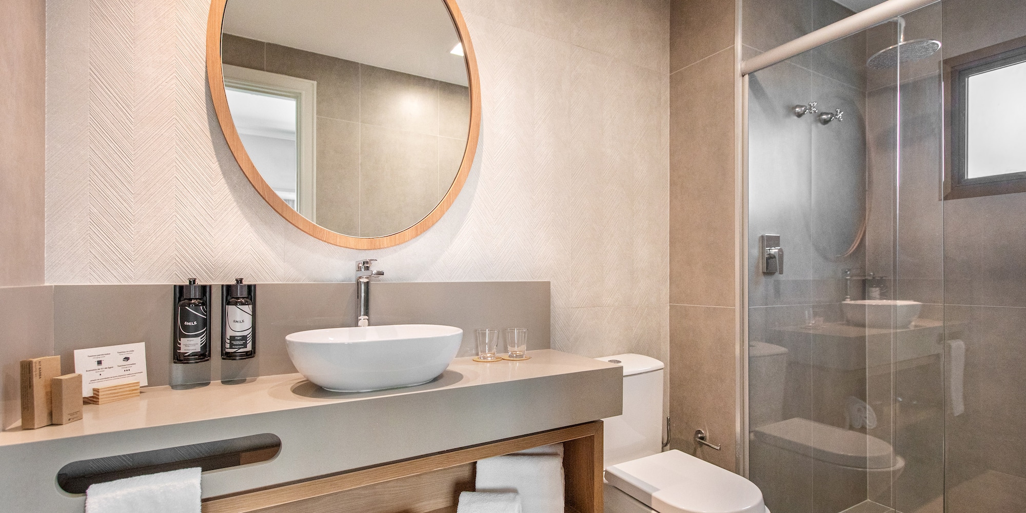 a bathroom with a mirror and a sink