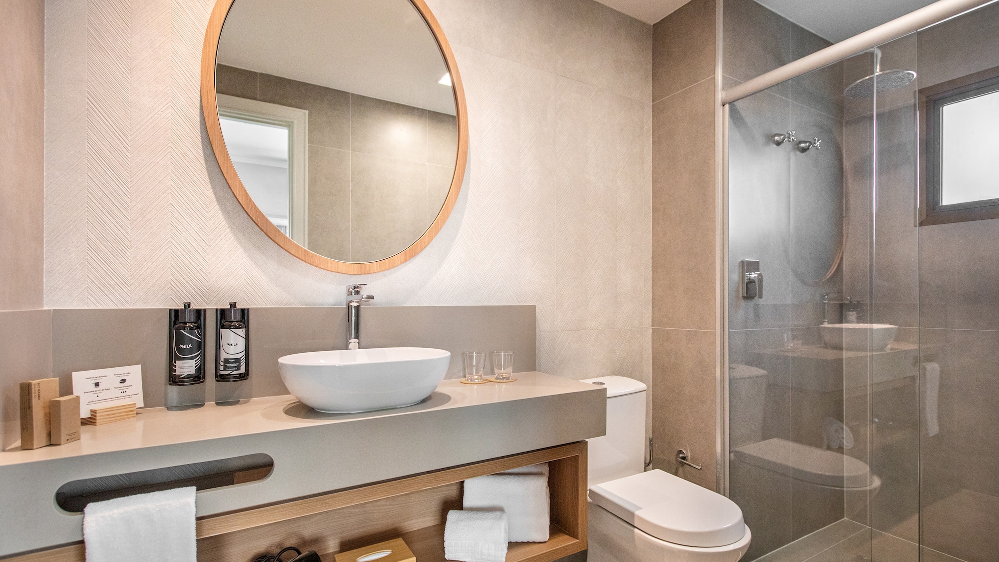 a bathroom with a mirror and a sink