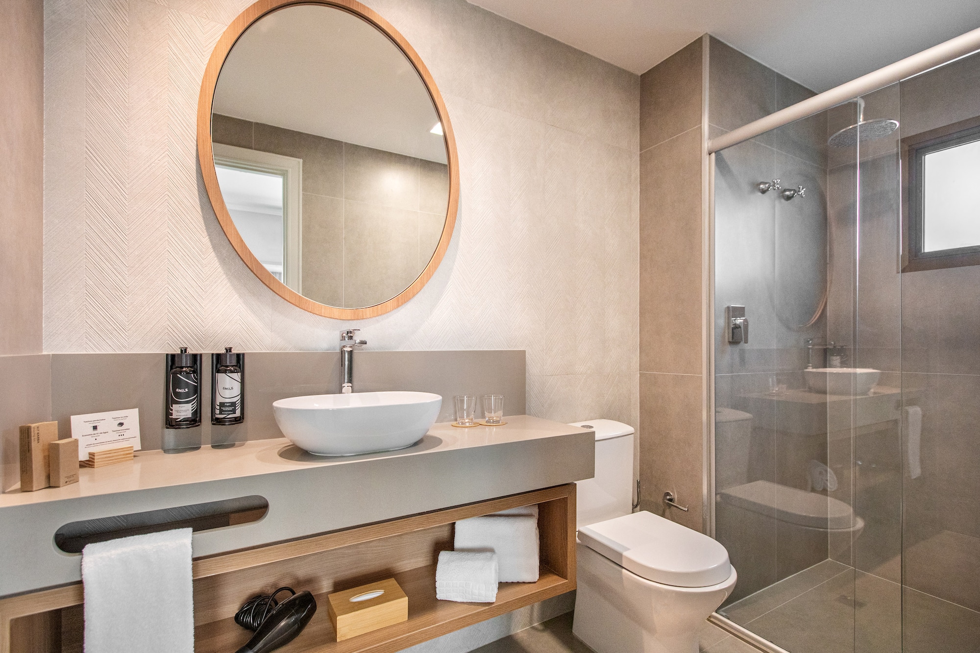 a bathroom with a mirror and a sink