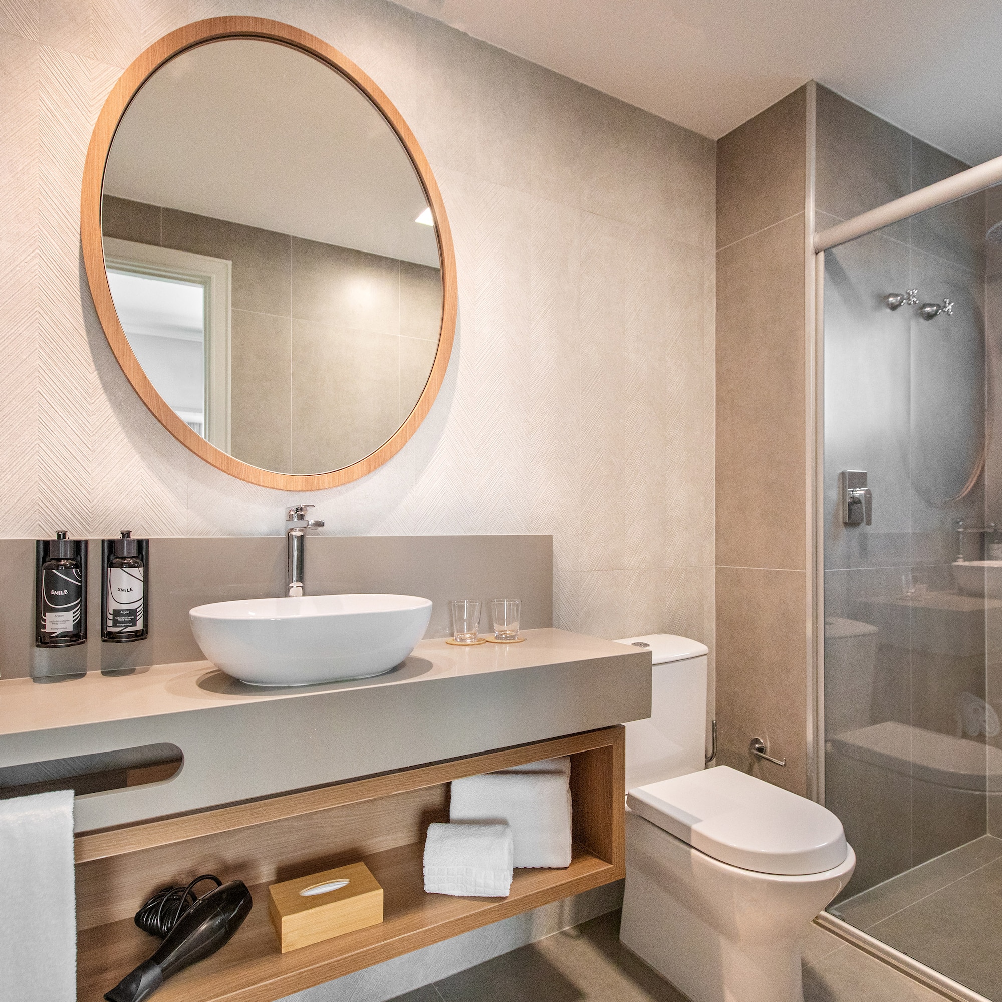 a bathroom with a mirror and a sink