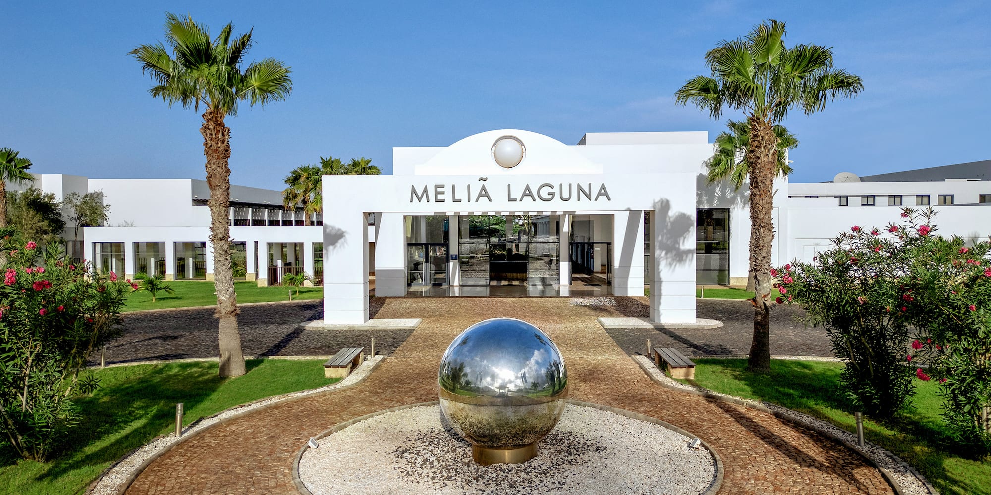 a building with a ball in front of it