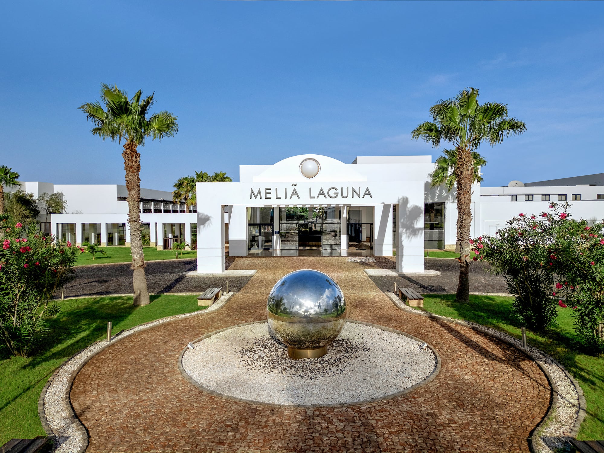 a building with a ball in front of it