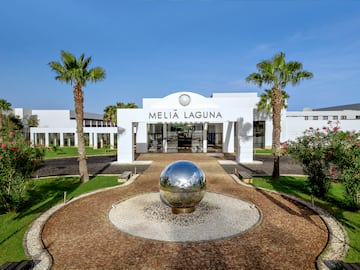 a building with a ball in front of it