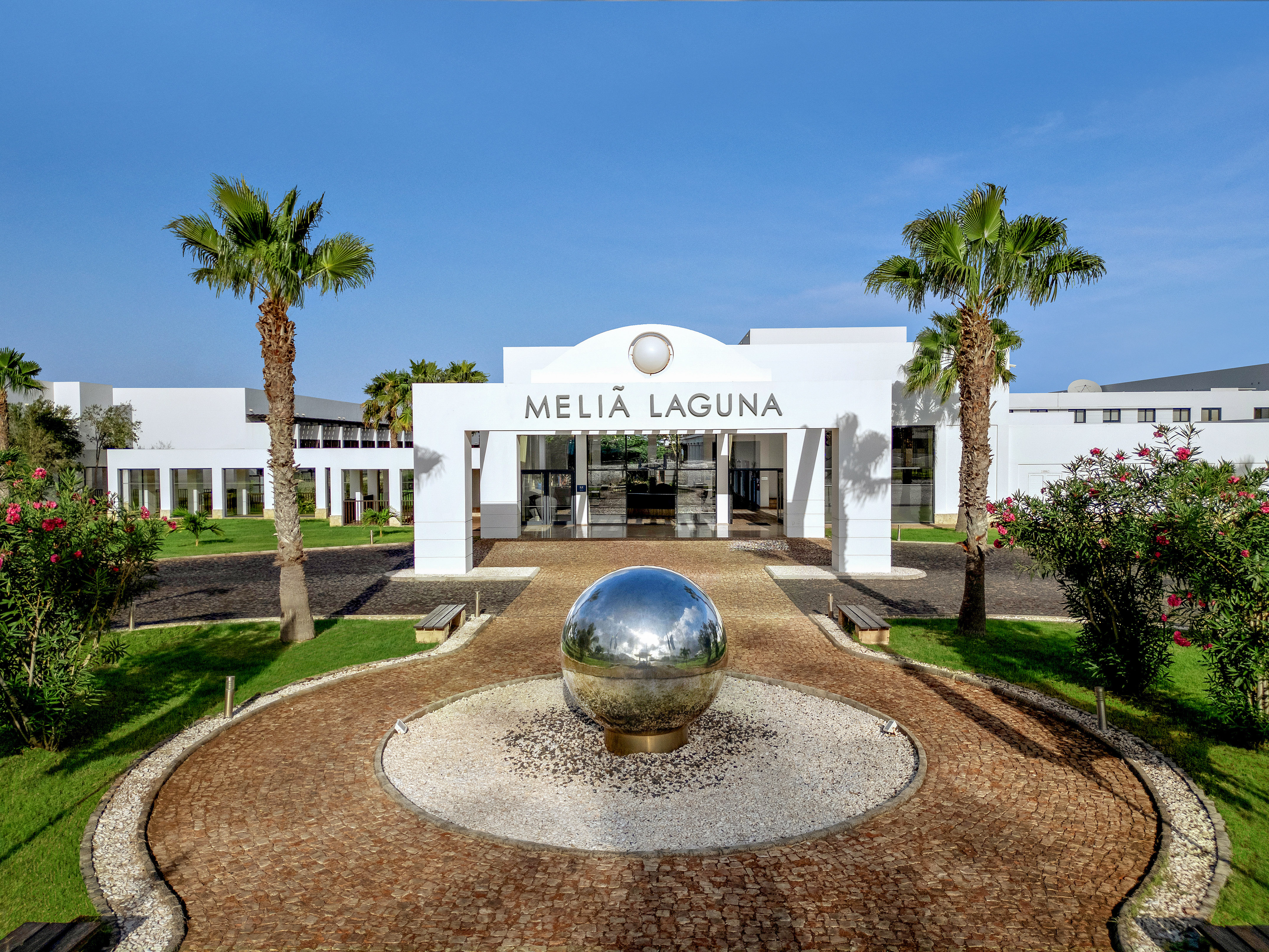 a building with a ball in front of it