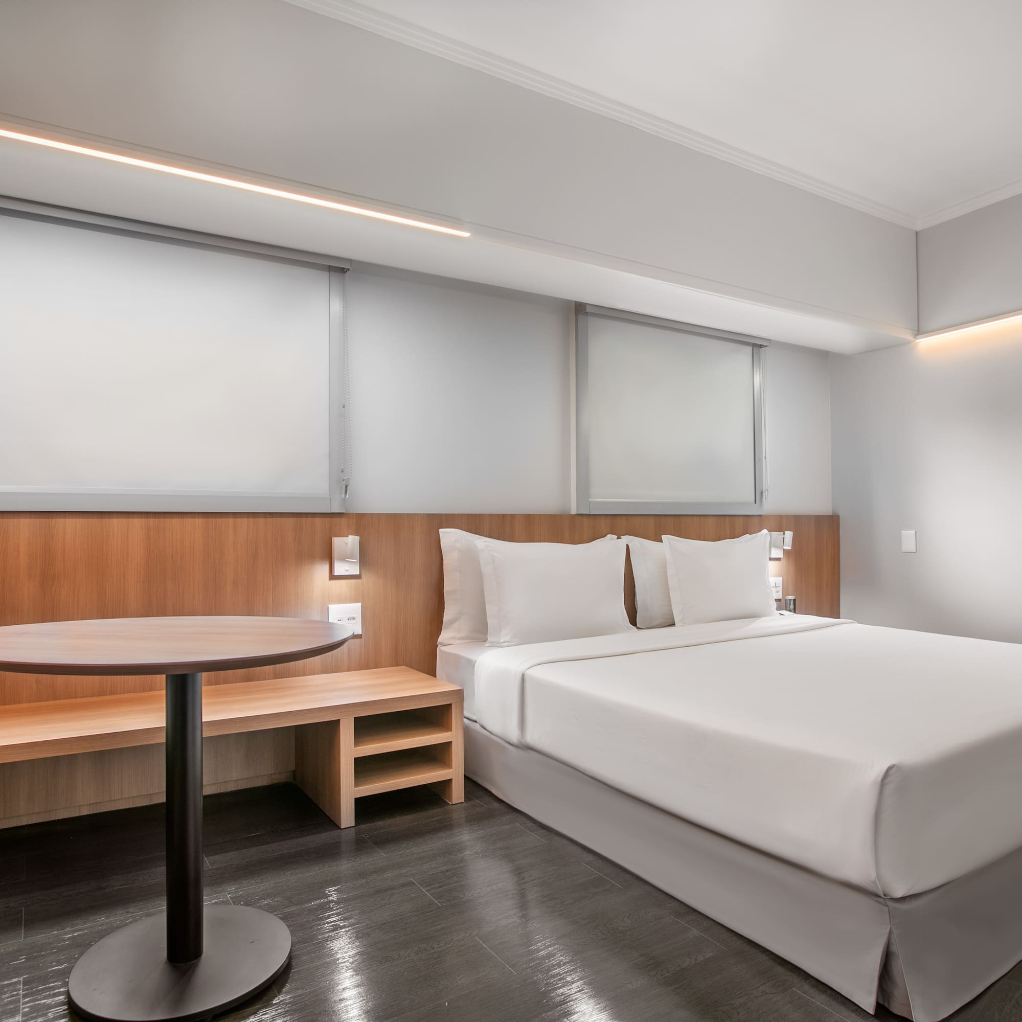 a room with a bed and a table