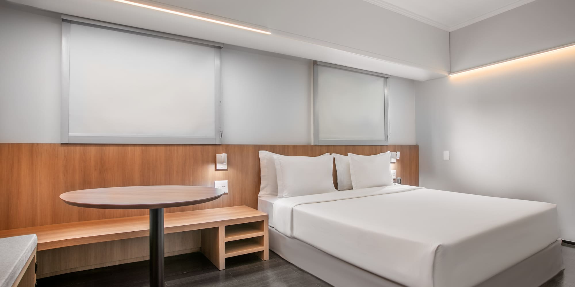 a room with a bed and a table