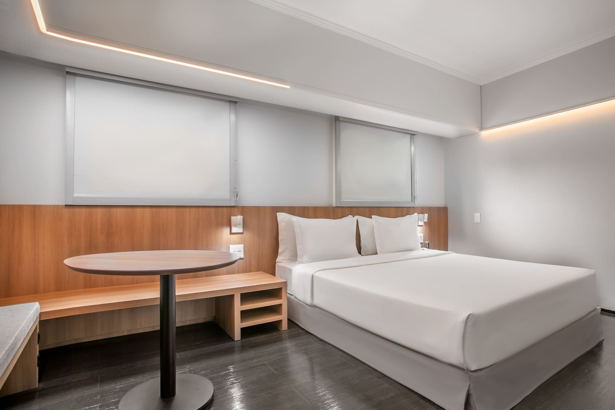 a room with a bed and a table