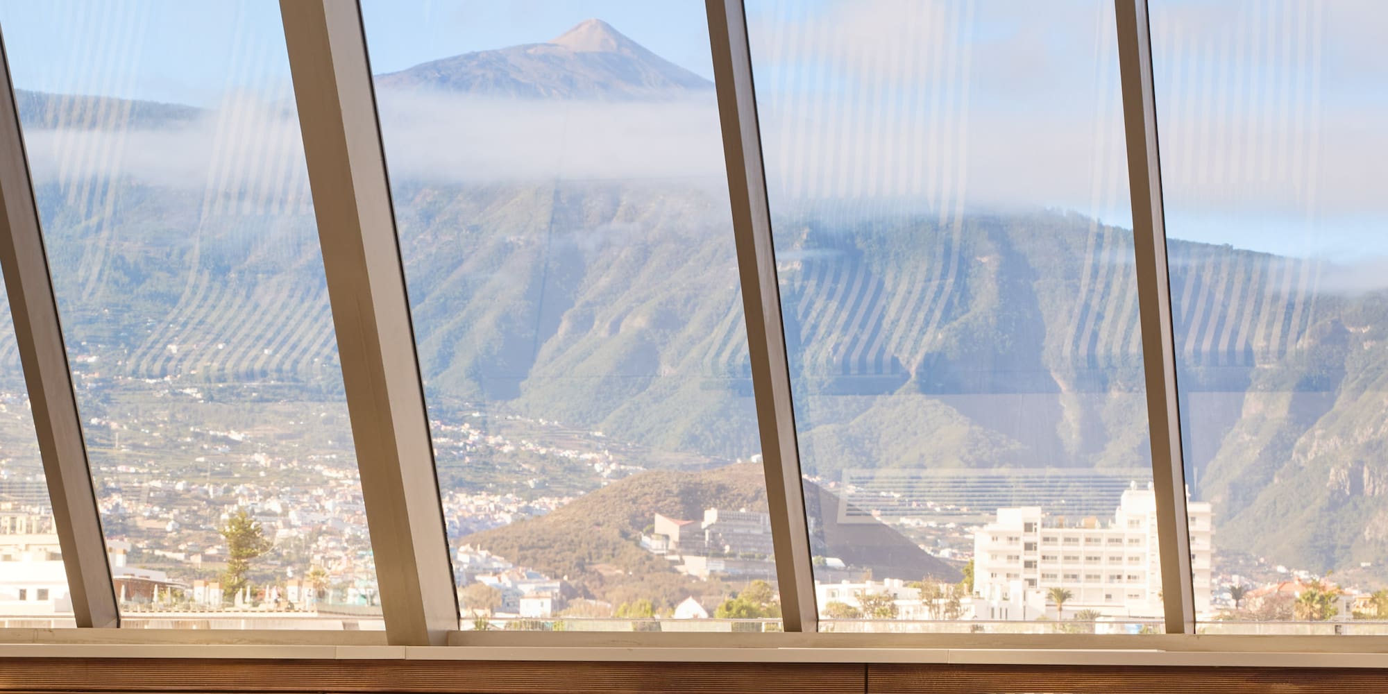 chairs in a room with large windows