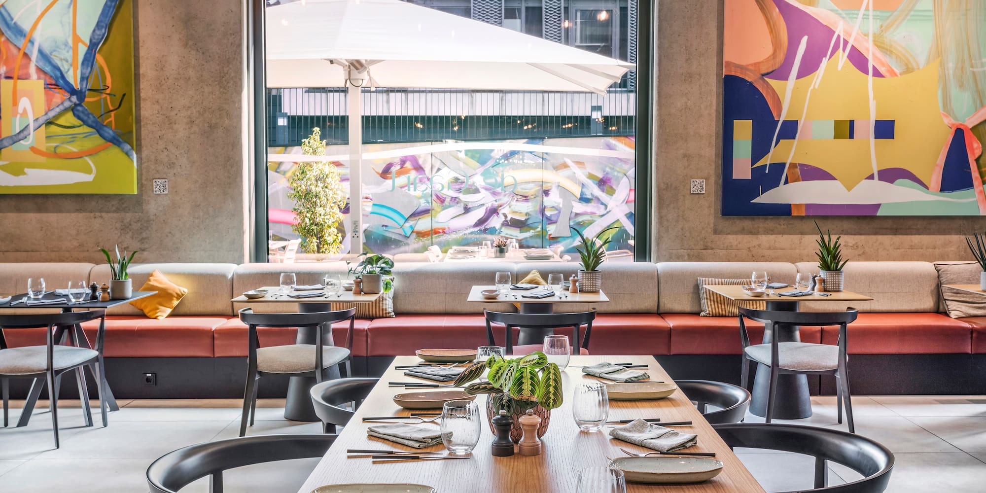 a restaurant with tables and chairs