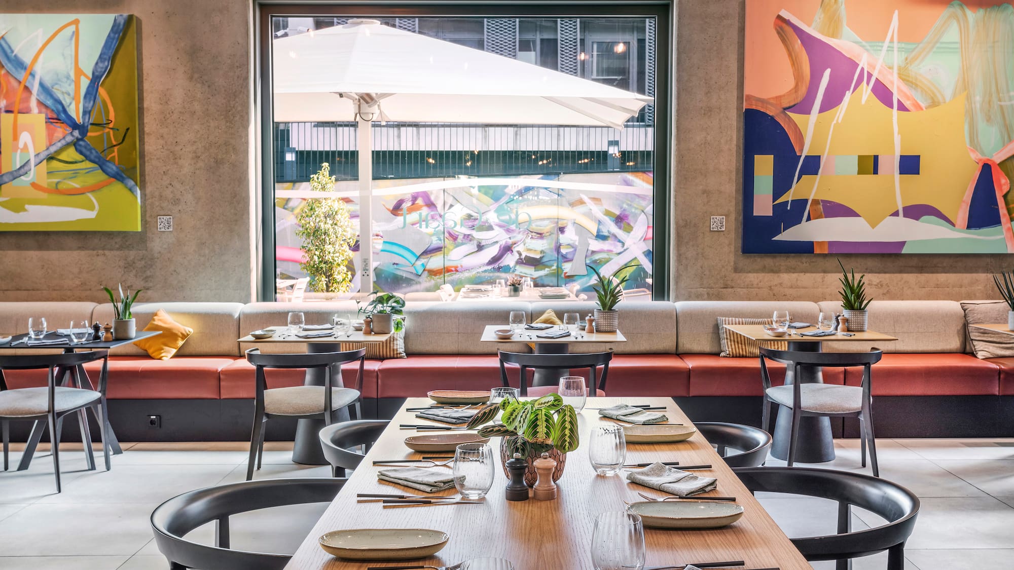 a restaurant with tables and chairs