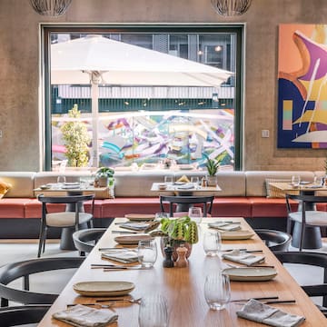 a restaurant with tables and chairs