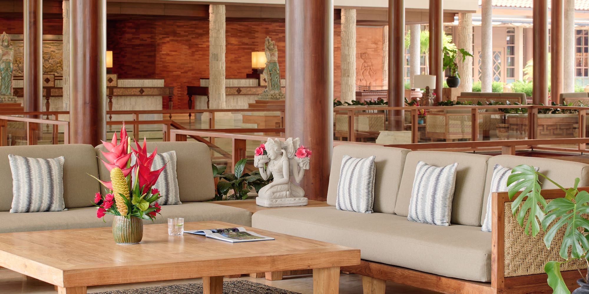 a couches and a coffee table in a lobby