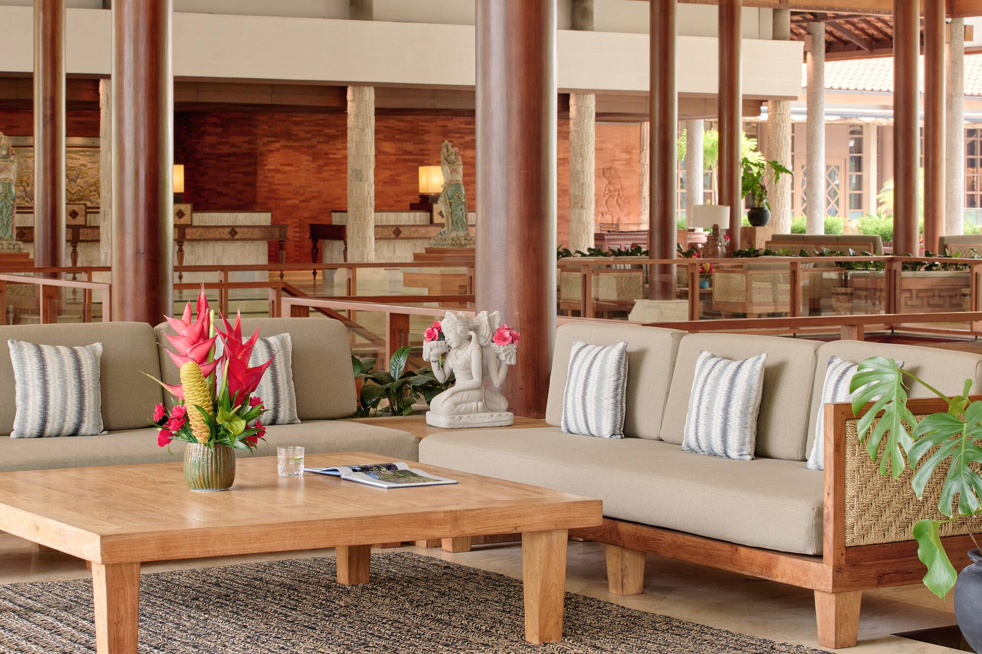 a couches and a coffee table in a lobby