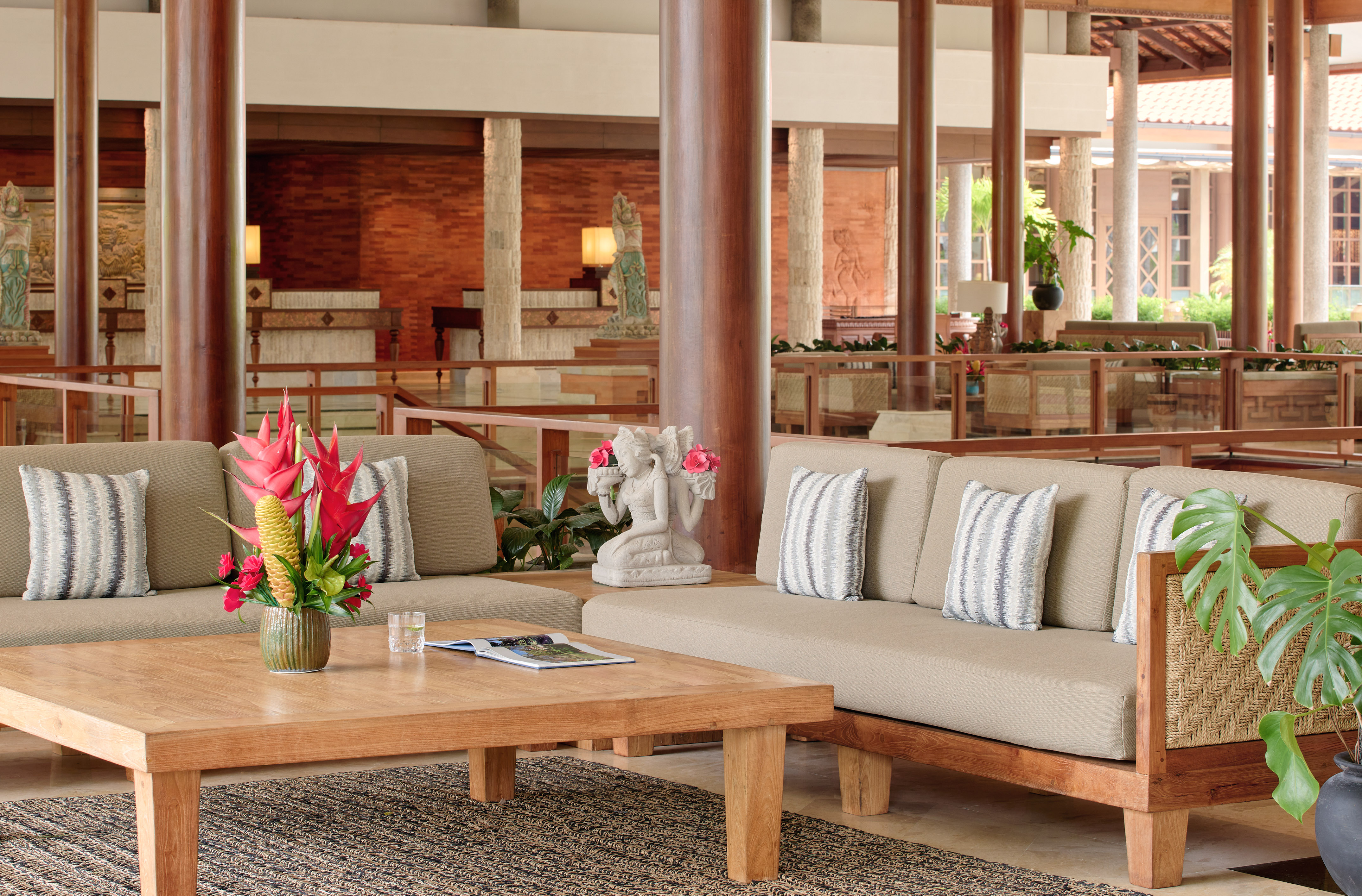 a couches and a coffee table in a lobby