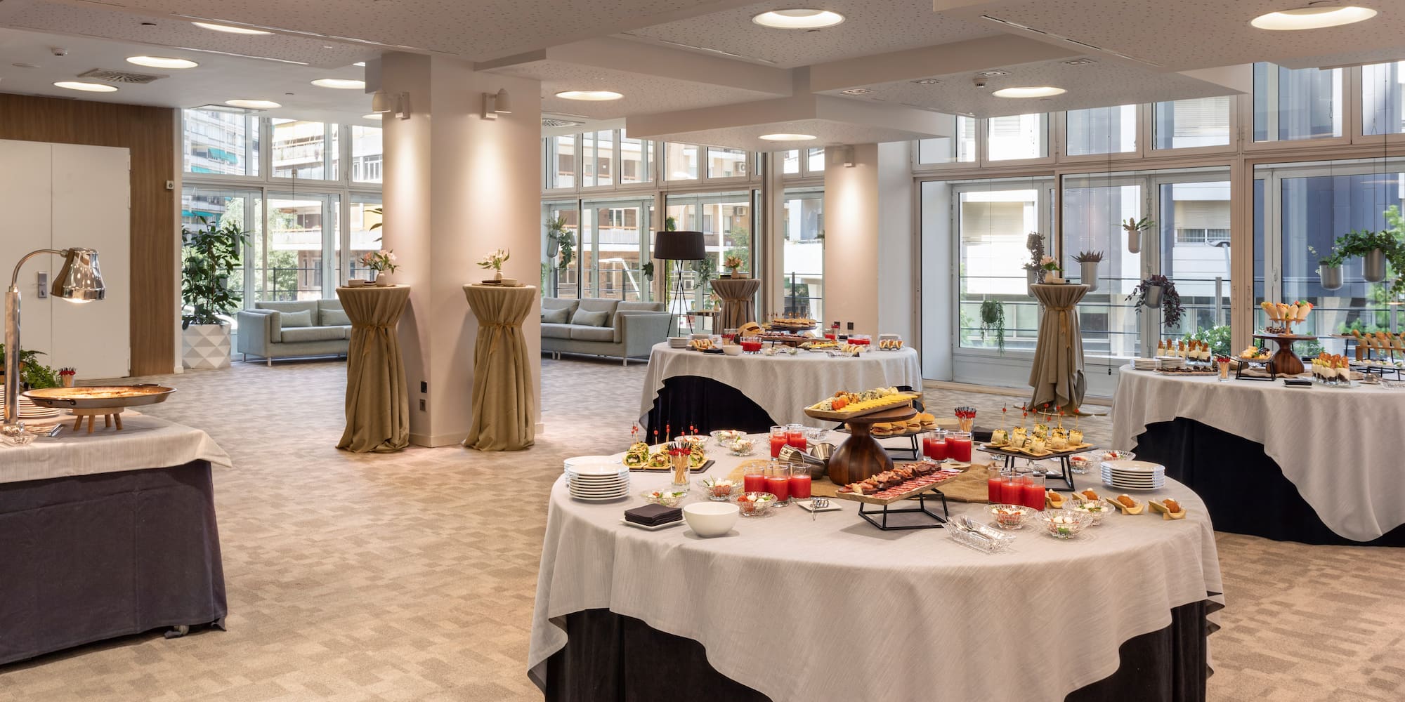 a large room with tables and food on it