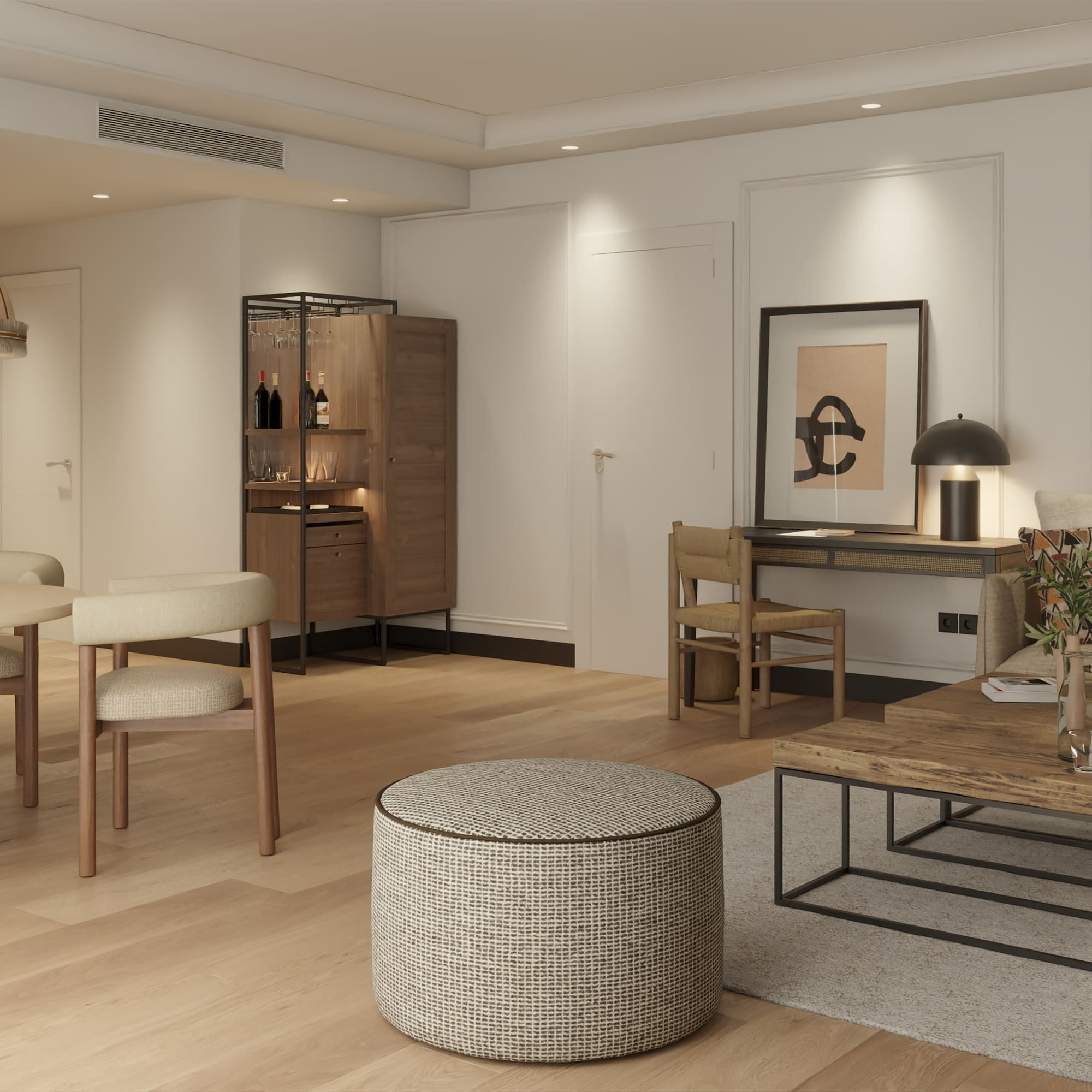 a living room with a table and chairs