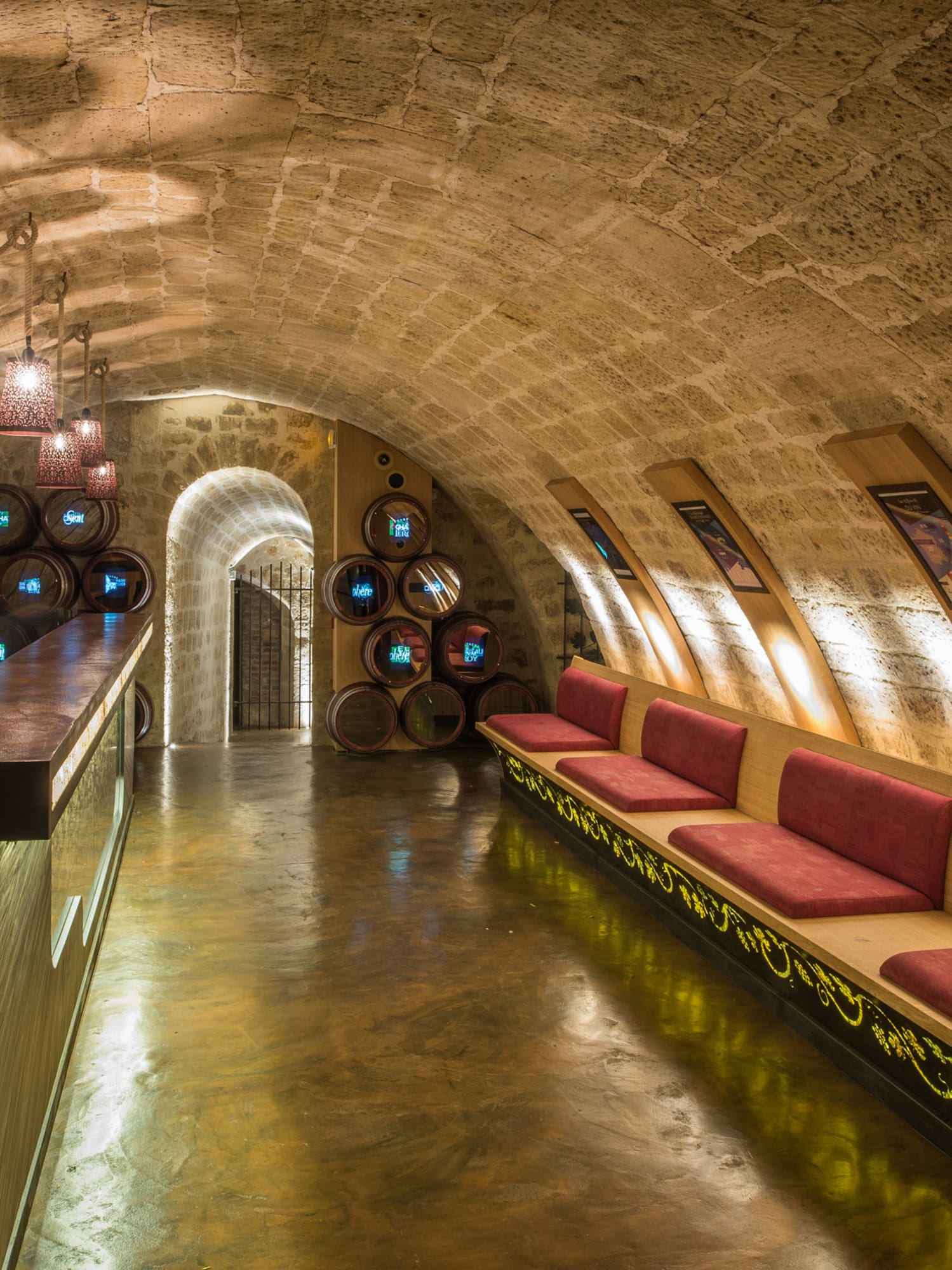 a room with a long bench and a bar