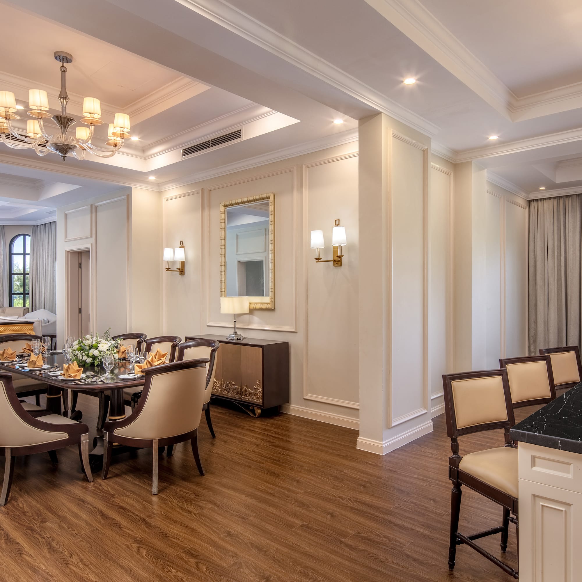 a room with a table and chairs