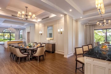 a room with a table and chairs