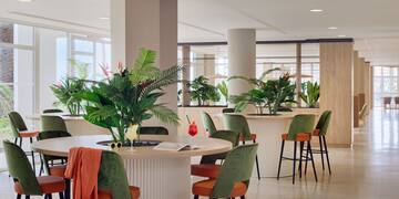 a room with tables and chairs