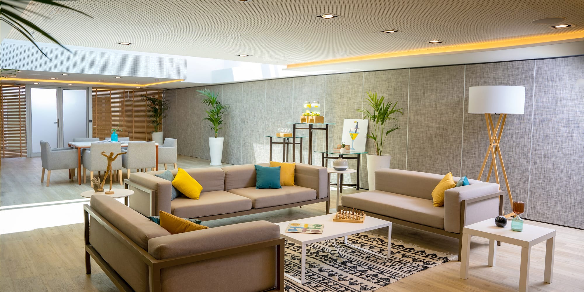 a room with couches and tables