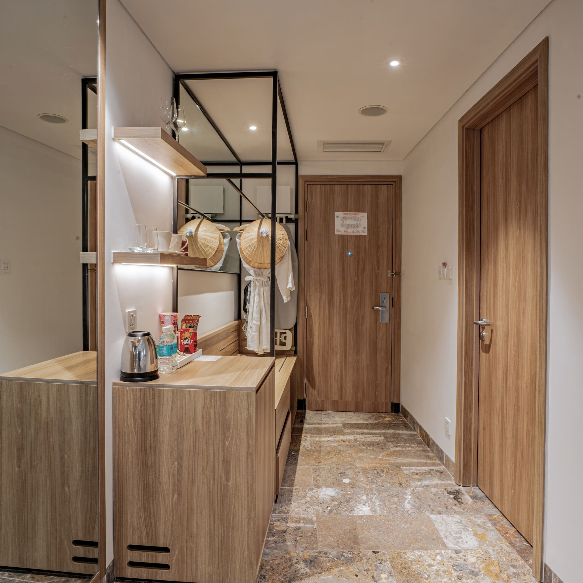 a room with a mirror and a counter